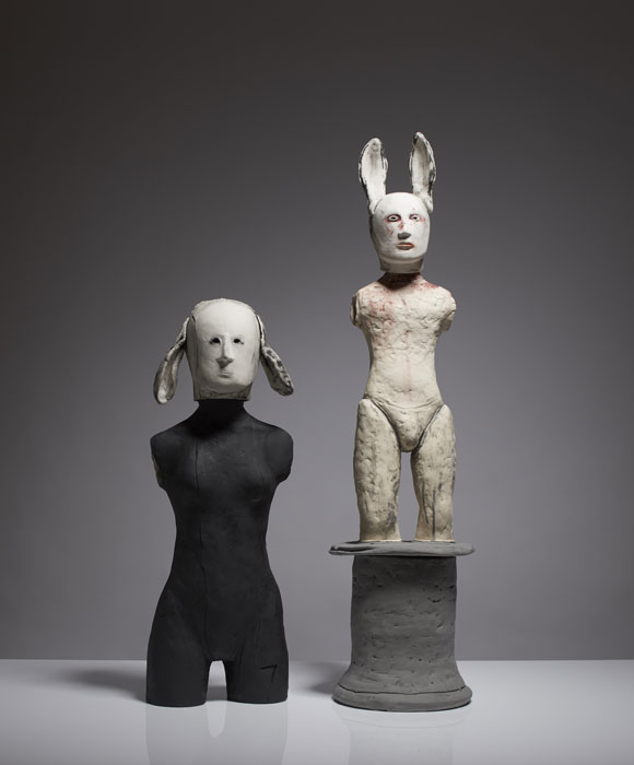 Lop-eared Woman & Statueerson